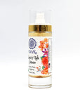 528 Hz Bright & Tight Activator bottle with floral label and gold pump, holistic skincare