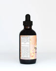 Amber glass dropper bottle with herbal tincture label and product instructions